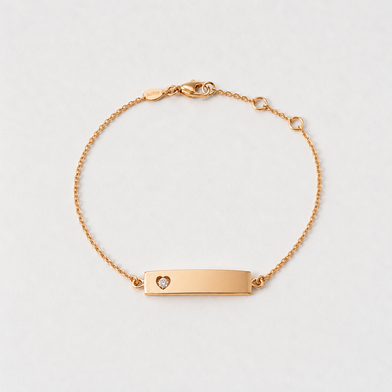Babyarmband mit Herz und Gravurplatte - Gold & Diamant