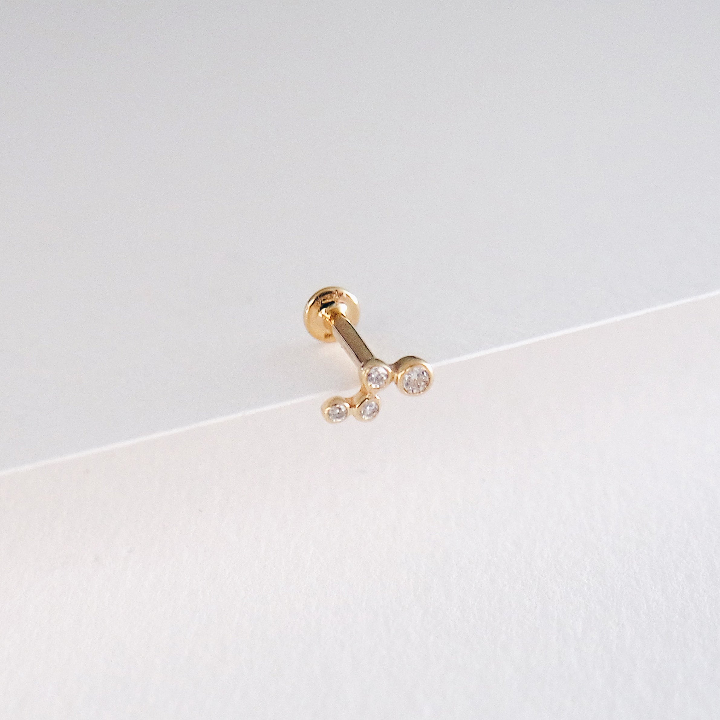 Chess Ear Piercing - Gold & Diamonds