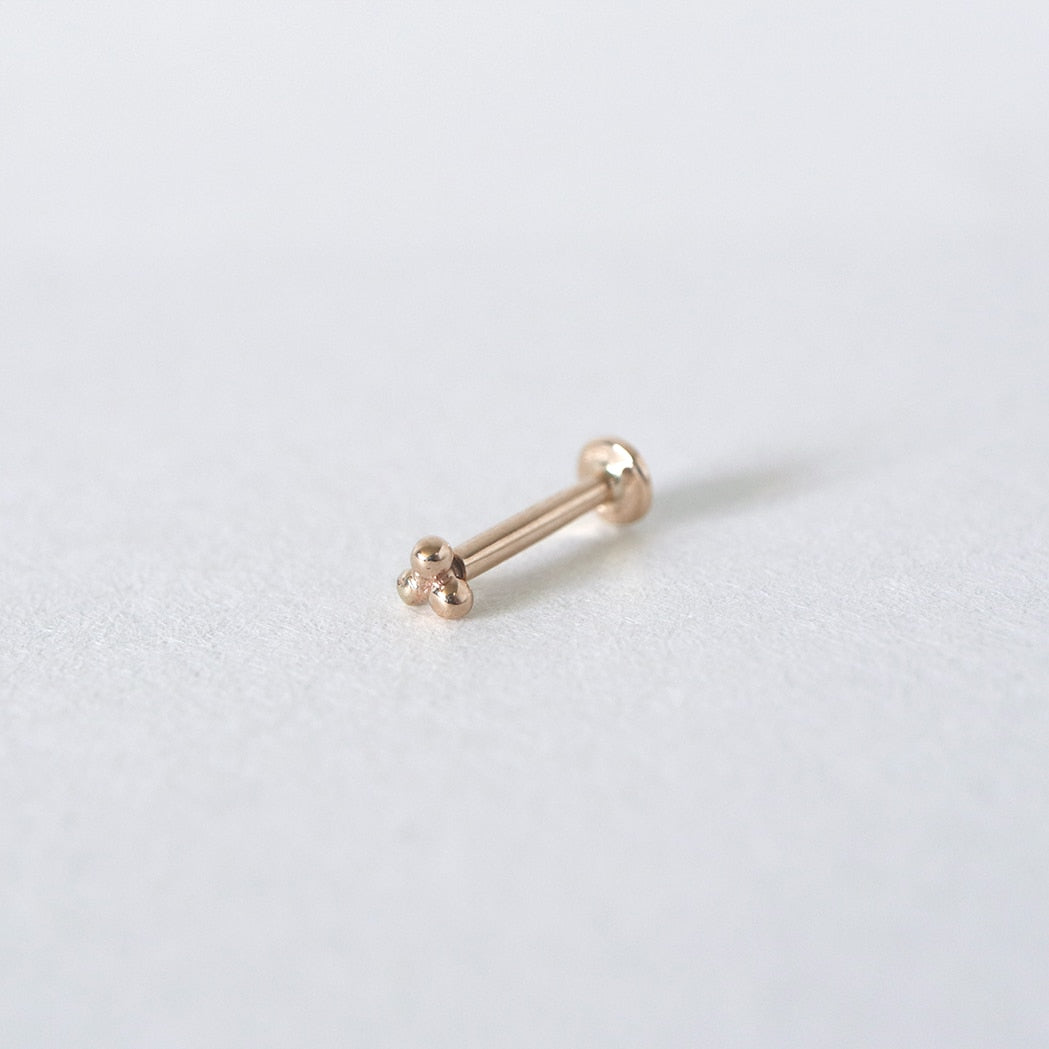 Trinity Gold Ear Piercing