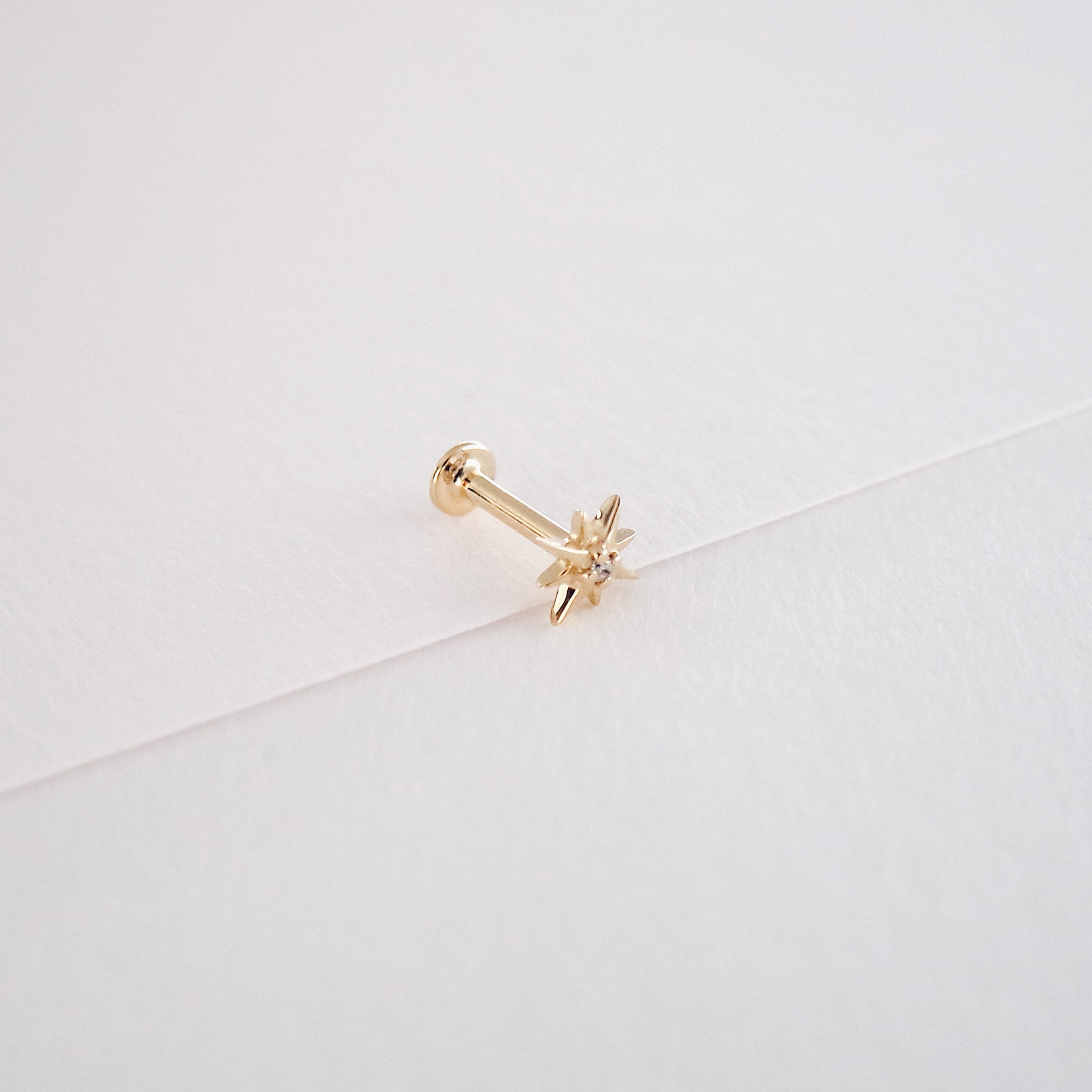 Polaris Ear Piercing - Gold & Diamonds